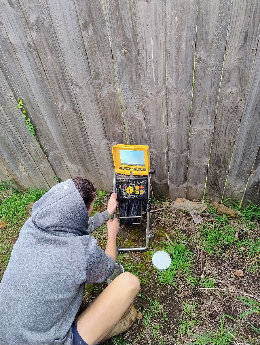 GCP plumber using drain camera